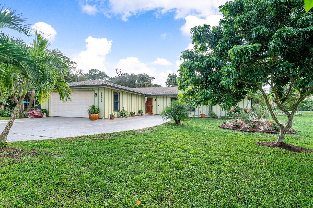 11402 178th Road North Jupiter, FL 33478 - Photo 2 of 49 002-11402178thRoadNorth-Jupiter-FL-33478
