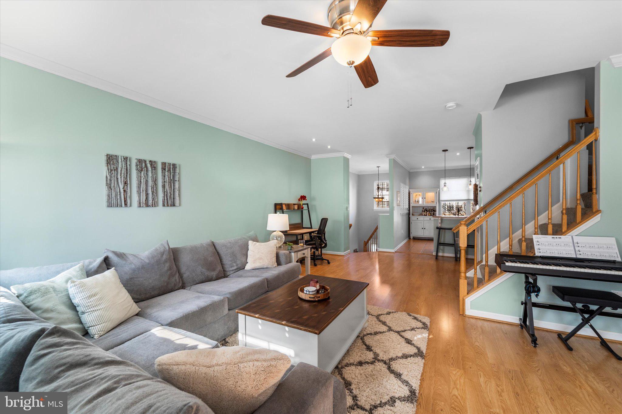 21070 Tyler Too Terrace Ashburn, VA 20147 - Photo 18 of 66 a living room with furniture and wooden floor