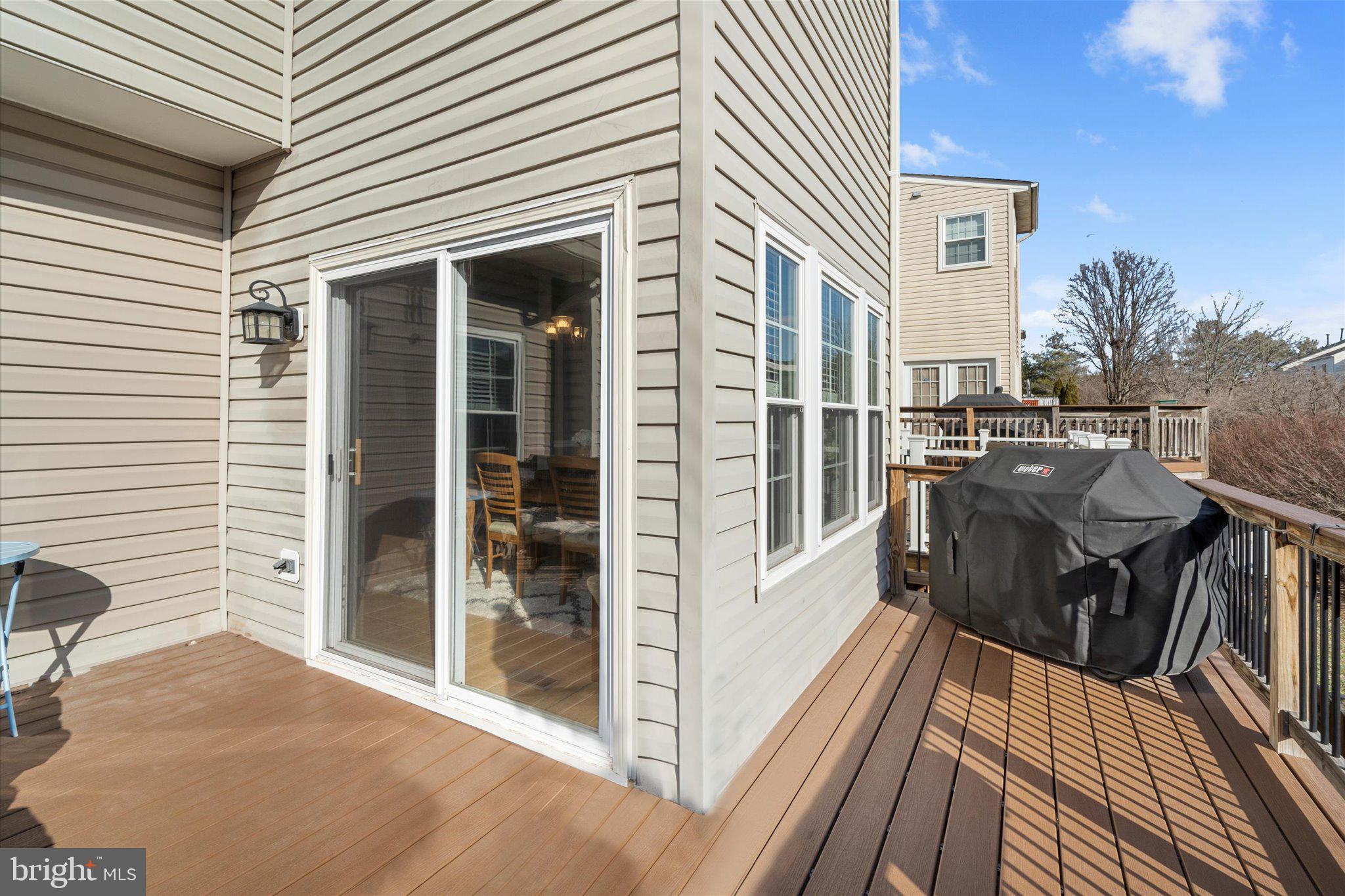 21070 Tyler Too Terrace Ashburn, VA 20147 - Photo 21 of 66 a view of a balcony with wooden floor