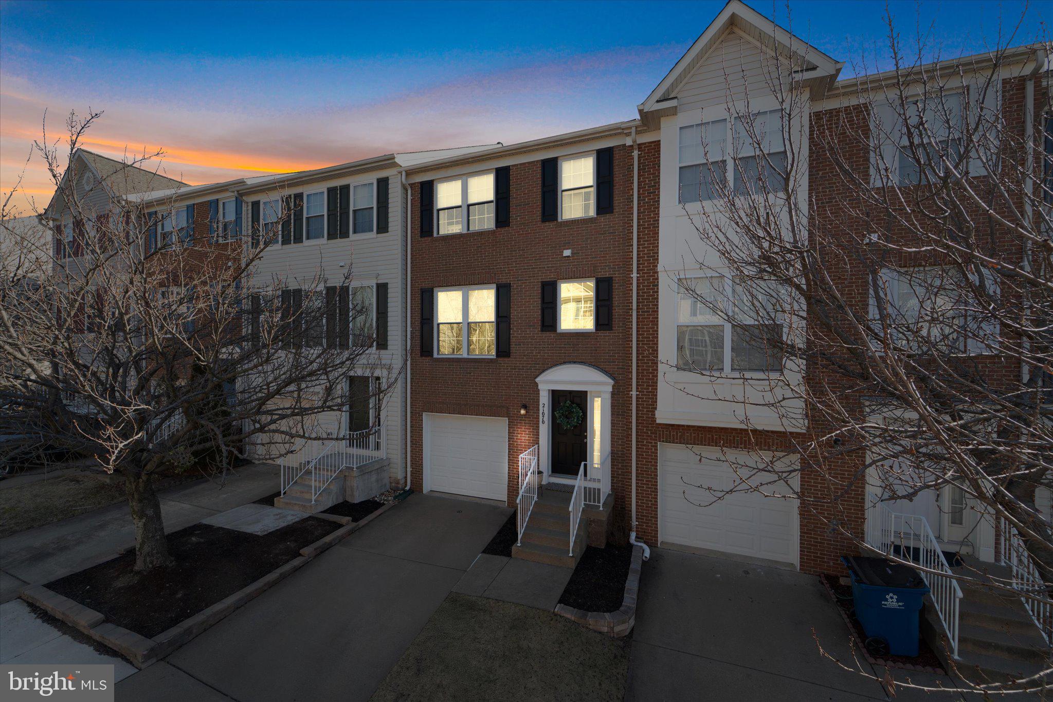 21070 Tyler Too Terrace Ashburn, VA 20147 - Photo 3 of 66 a view of back yard of the house