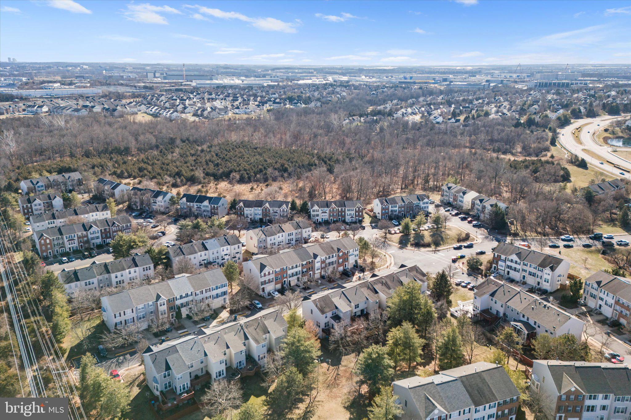 21070 Tyler Too Terrace Ashburn, VA 20147 - Photo 40 of 66 an aerial view of multiple house