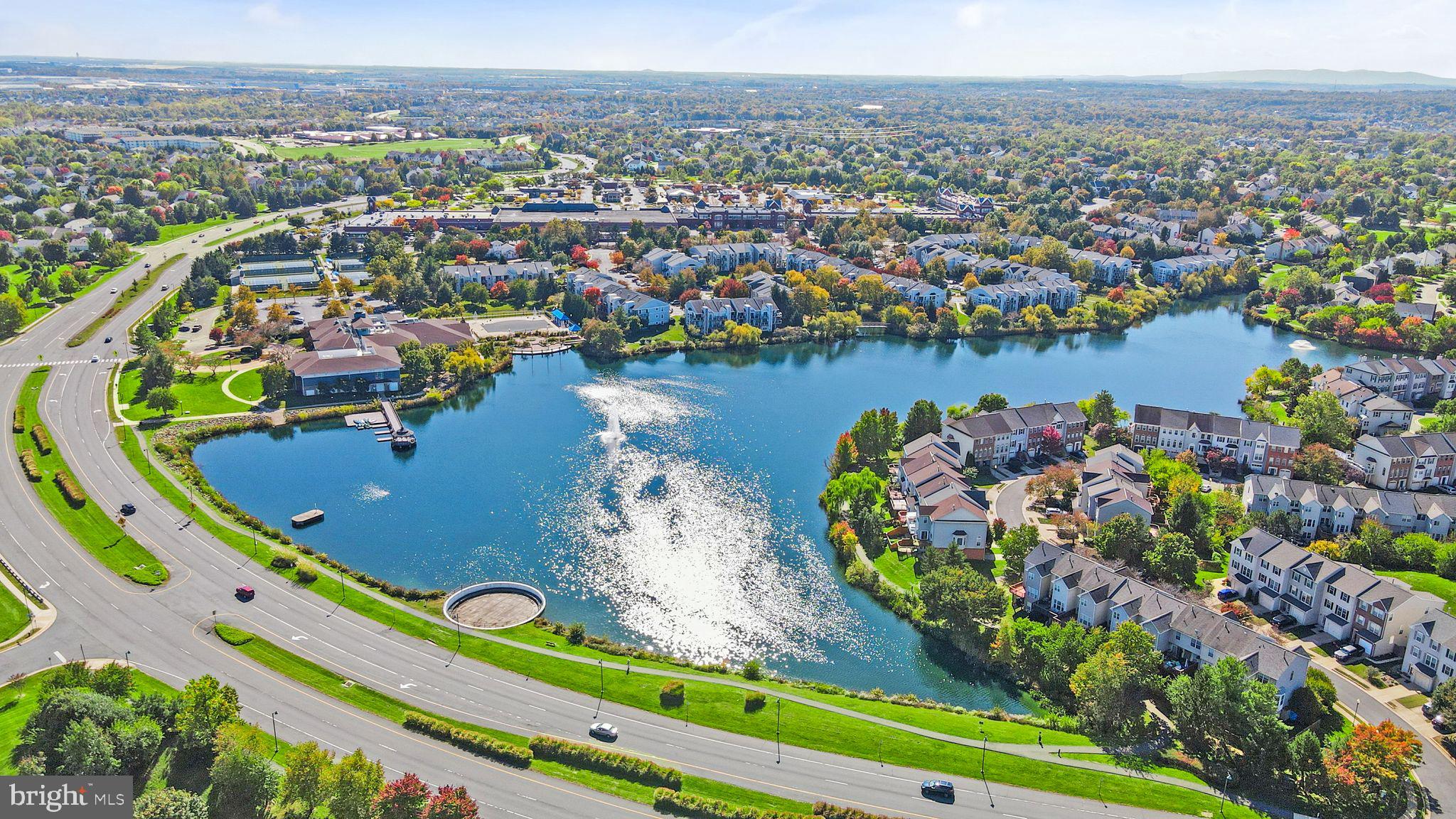 21070 Tyler Too Terrace Ashburn, VA 20147 - Photo 47 of 66 an aerial view of a house with a lake view