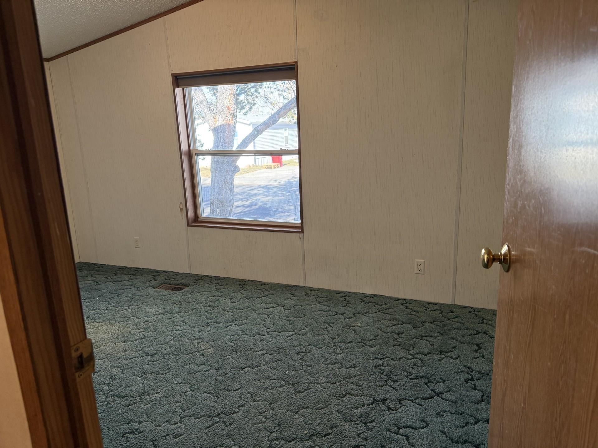 435 32 Road, Unit 227 Clifton, CO 81520 - Photo 10 of 18 an empty room with a window