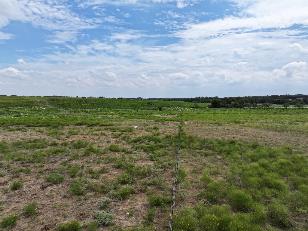 834 Doss Lane Moody, TX 76557 - Photo 3 of 10 a view of a field of grass and trees