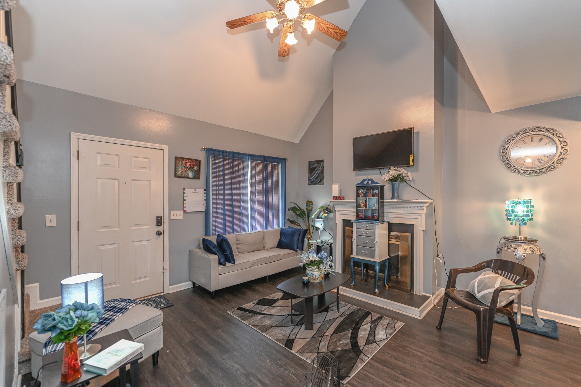 508 Robbie Ann Court Madison, TN 37115 - Photo 14 of 38 a living room with furniture a flat screen tv and a fireplace