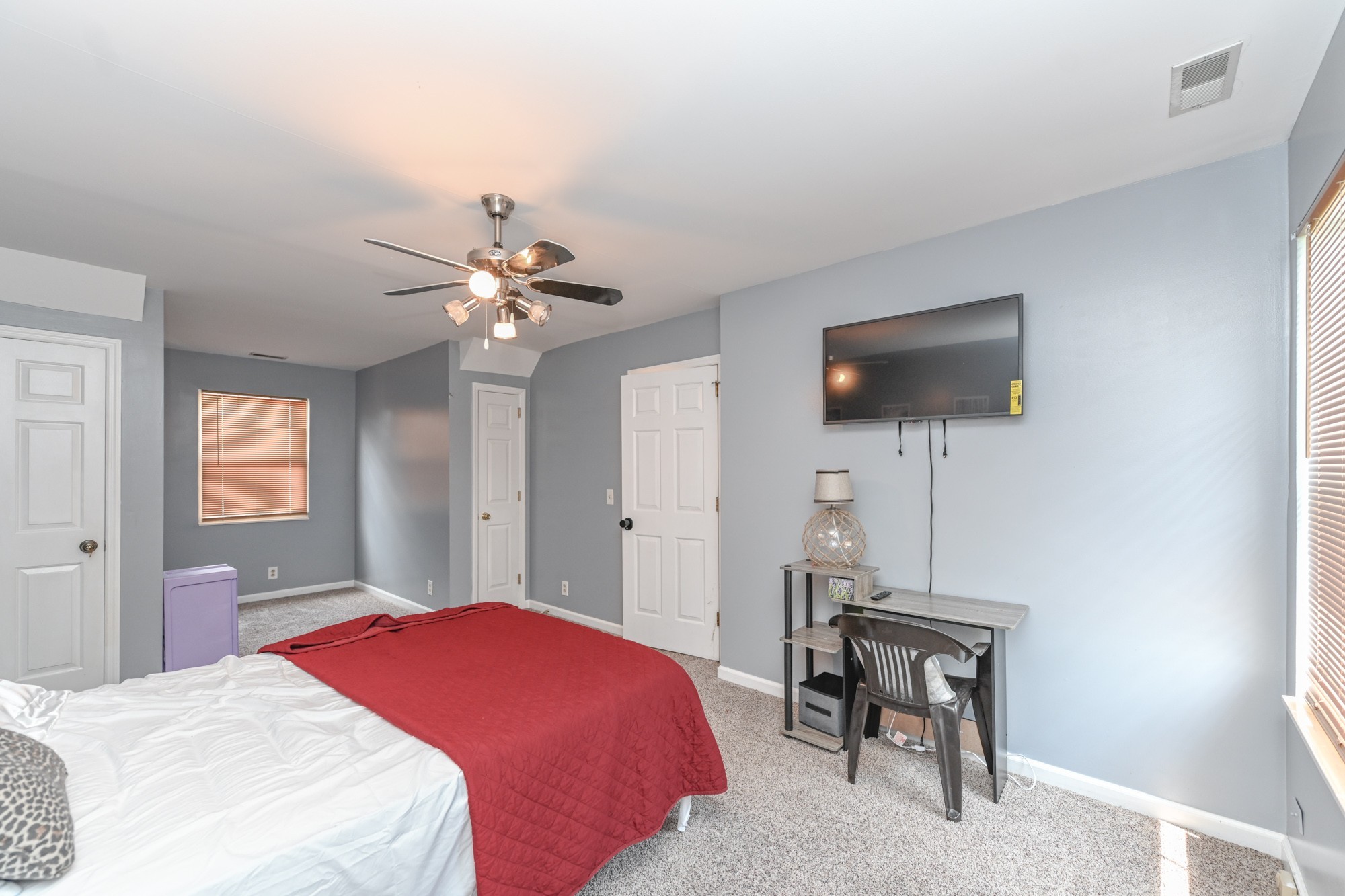 508 Robbie Ann Court Madison, TN 37115 - Photo 35 of 38 a bedroom with a bed and a flat screen tv