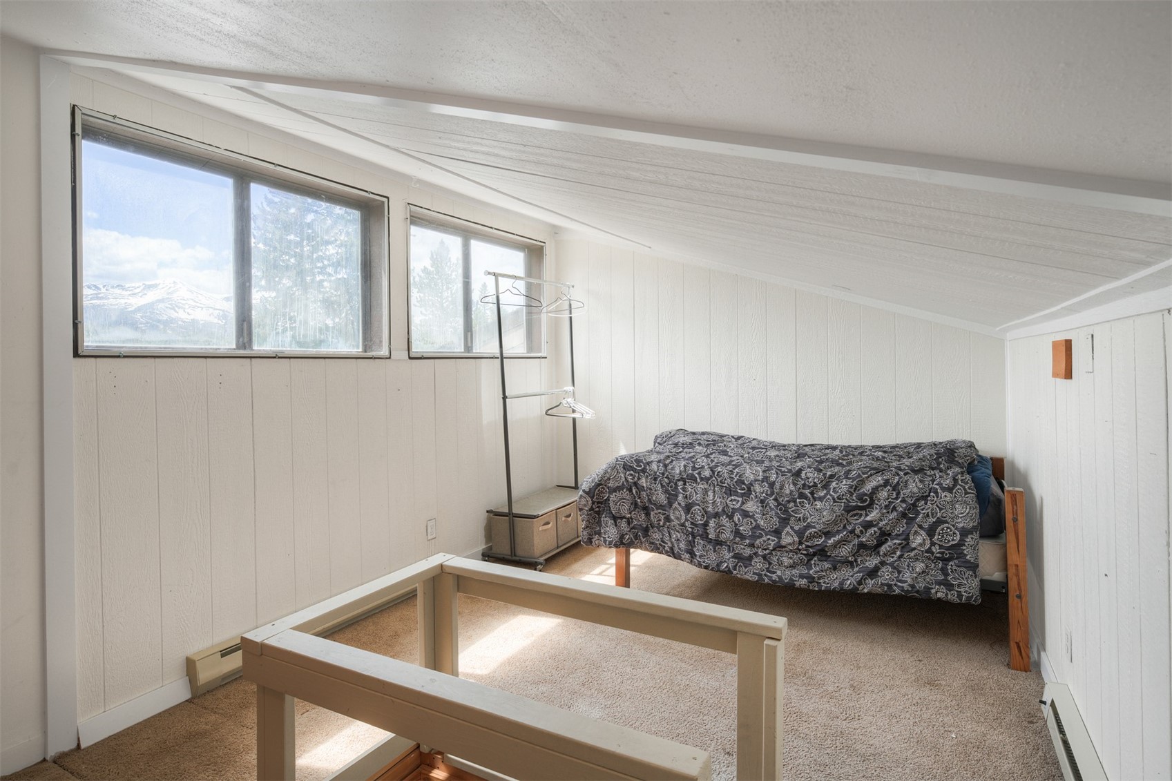 132 Illinois Gulch Road, Unit 3 Breckenridge, CO 80424 - Photo 23 of 32 a bedroom with a bed and window