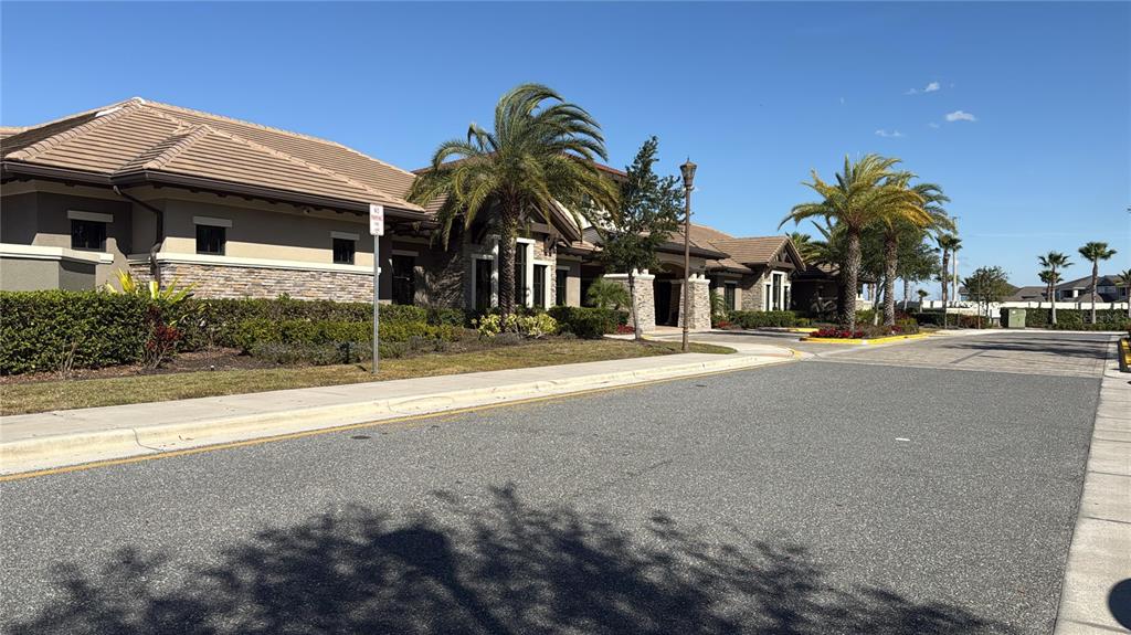 2840 Chantilly Avenue Kissimmee, FL 34741 - Photo 14 of 22 a front view of a house with a yard