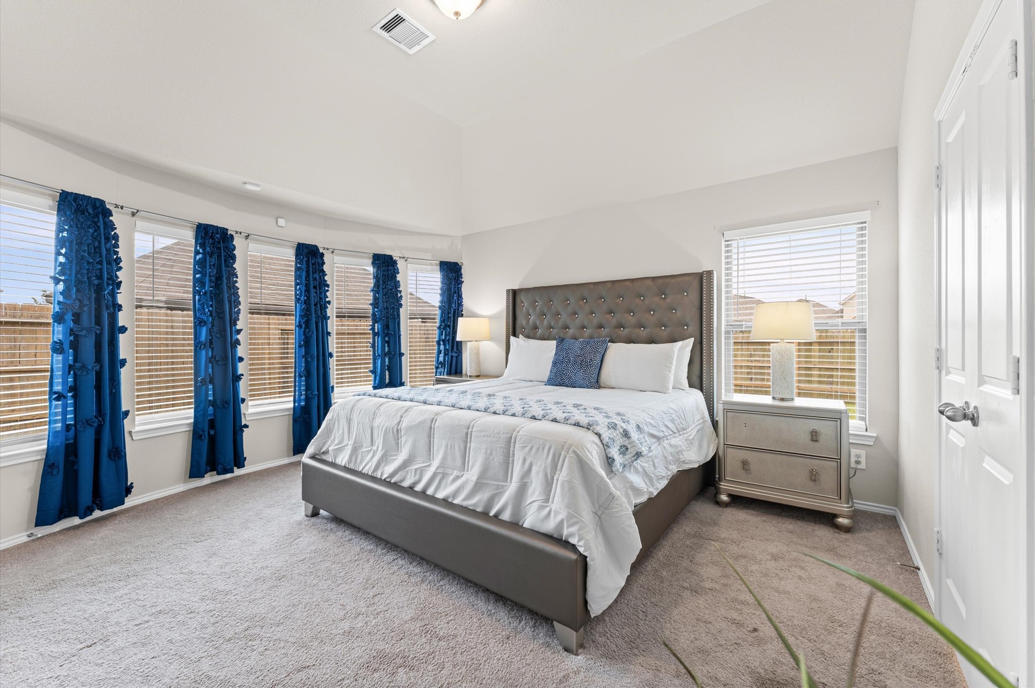 2702 Meadow View Lane Conroe, TX 77385 - Photo 10 of 26 a bed sitting in a bedroom next to a window
