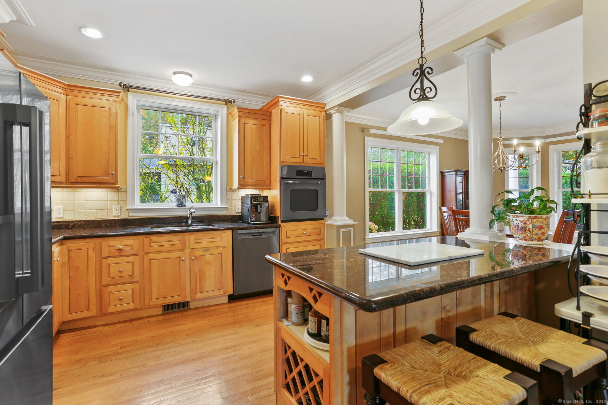 25 Country Road, Unit 25 Fairfield, CT 06824 - Photo 21 of 40 a kitchen with stainless steel appliances granite countertop sink stove and refrigerator