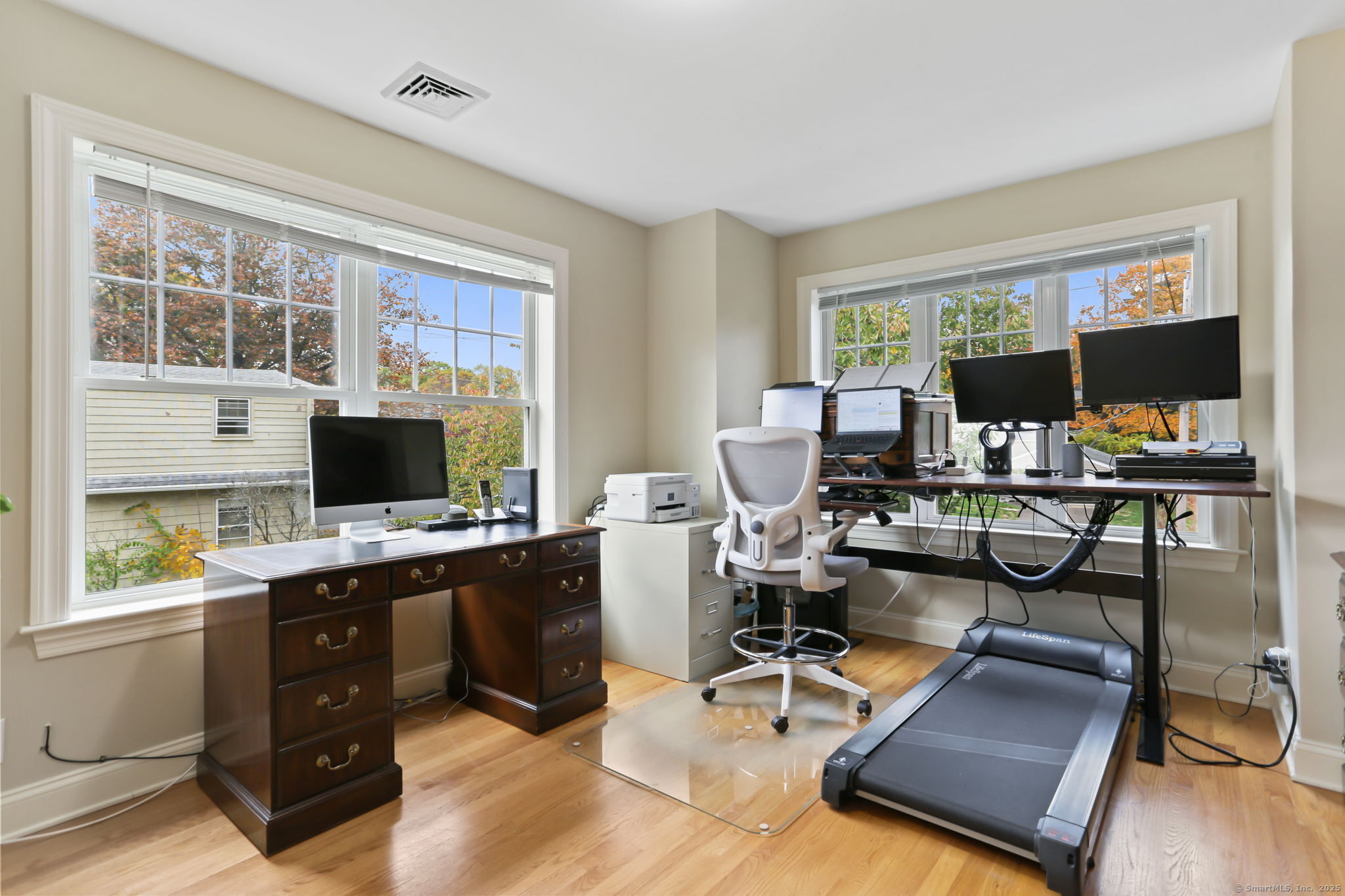 25 Country Road, Unit 25 Fairfield, CT 06824 - Photo 26 of 40 a view of a workspace with furniture and a window