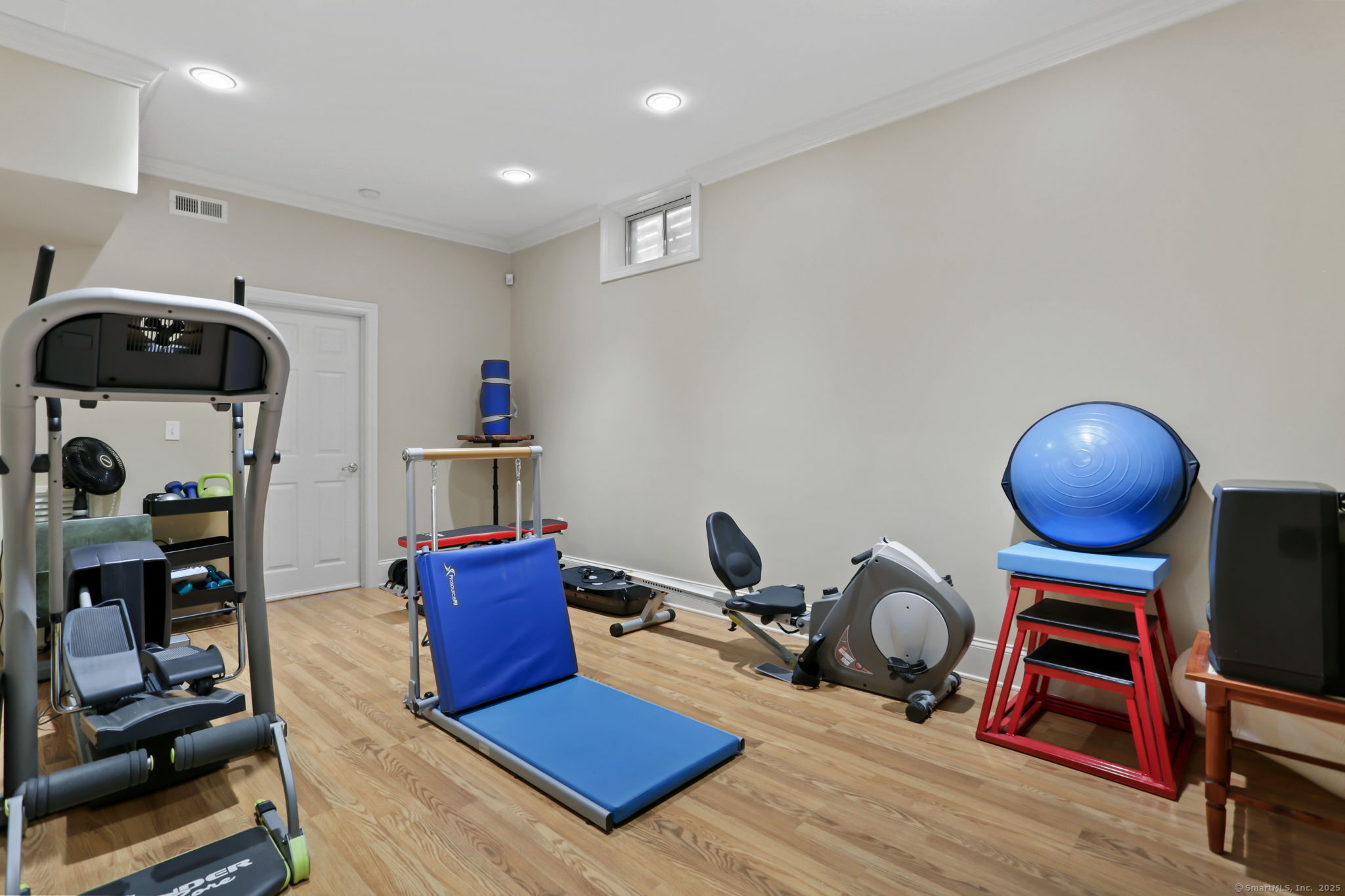 25 Country Road, Unit 25 Fairfield, CT 06824 - Photo 35 of 40 a living room with furniture and a flat screen tv