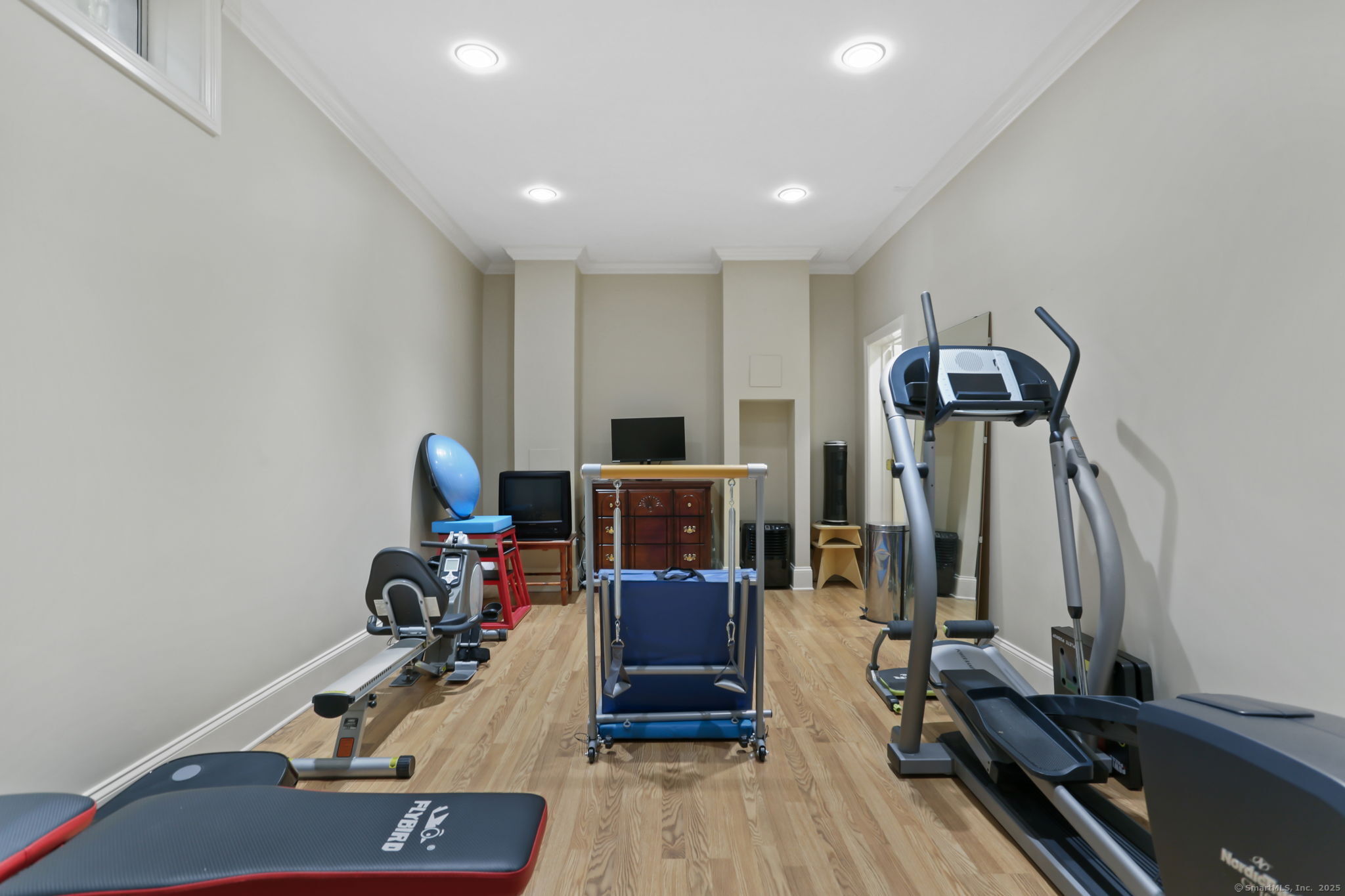 25 Country Road, Unit 25 Fairfield, CT 06824 - Photo 36 of 40 a view of a room with gym equipment