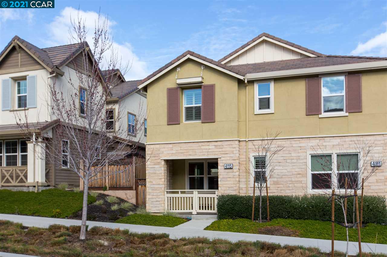4115 Wallis Ranch Drive Dublin, CA 94568 - Photo 1 of 1 a front view of a house with a yard and garage