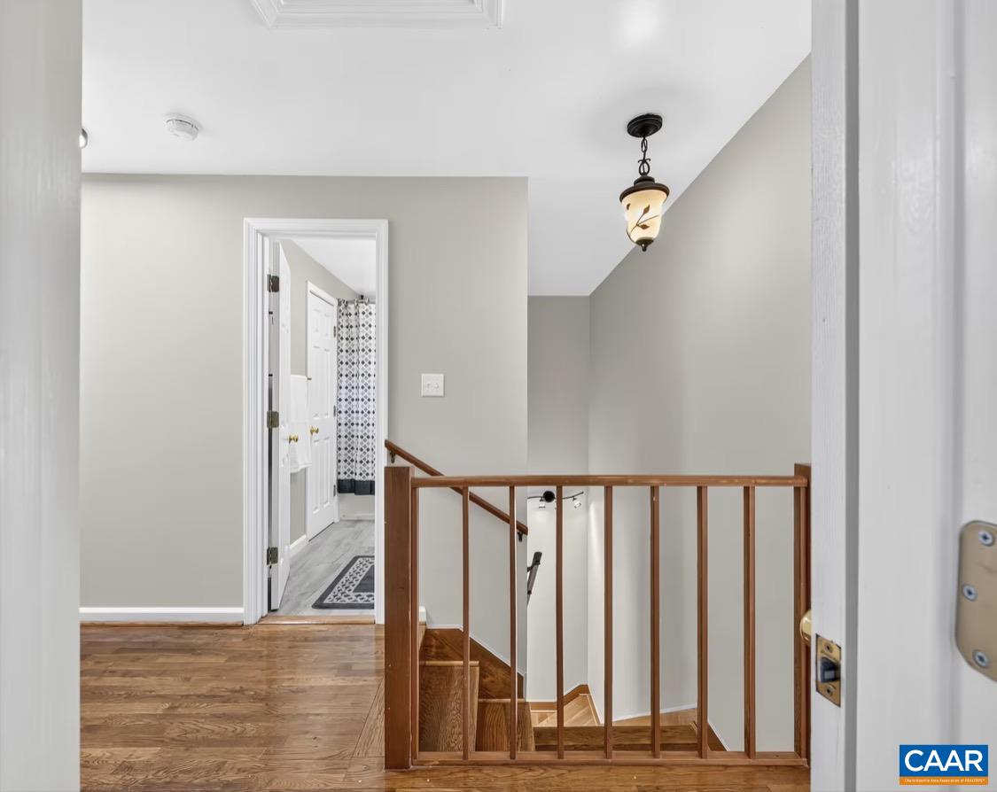 5512 Secretarys Sand Road Esmont, VA 22937 - Photo 18 of 30 2nd floor landing looking downstairs and 2nd bathroom