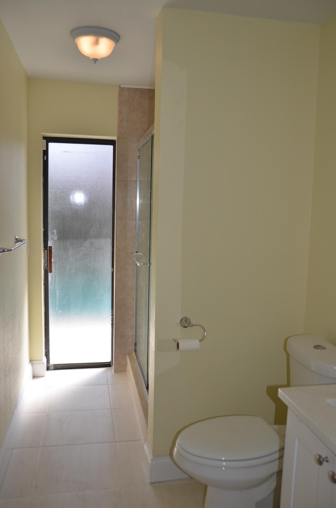 2932 Northwest 24th Way Boca Raton, FL 33431 - Photo 11 of 15 Frosted door