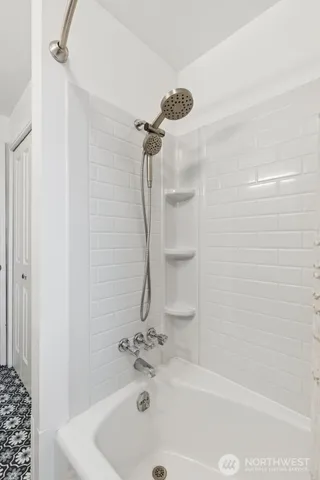 a bathroom with a bathtub