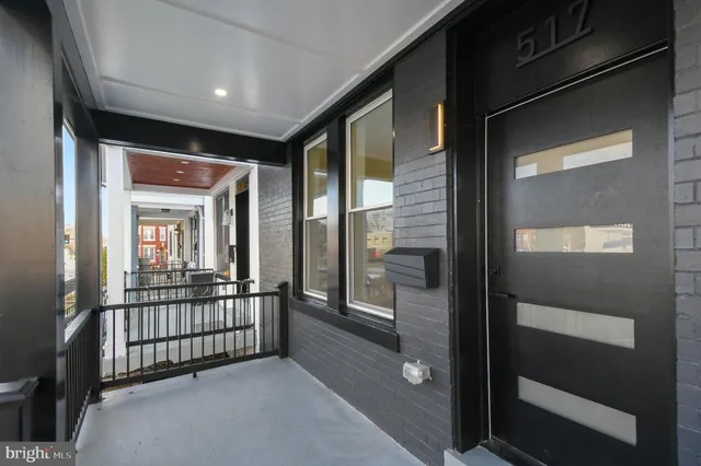 a view of a room with a large window