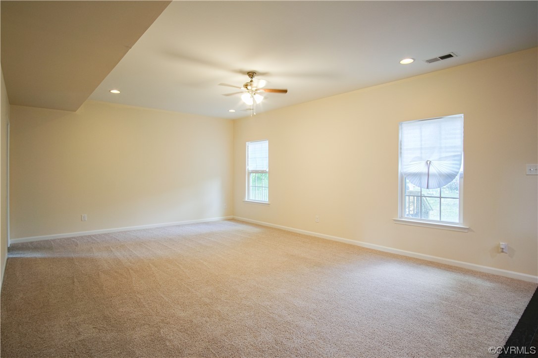 12800 Bailey Valley Drive Midlothian, VA 23112 - Photo 11 of 31 an empty room with windows and fan