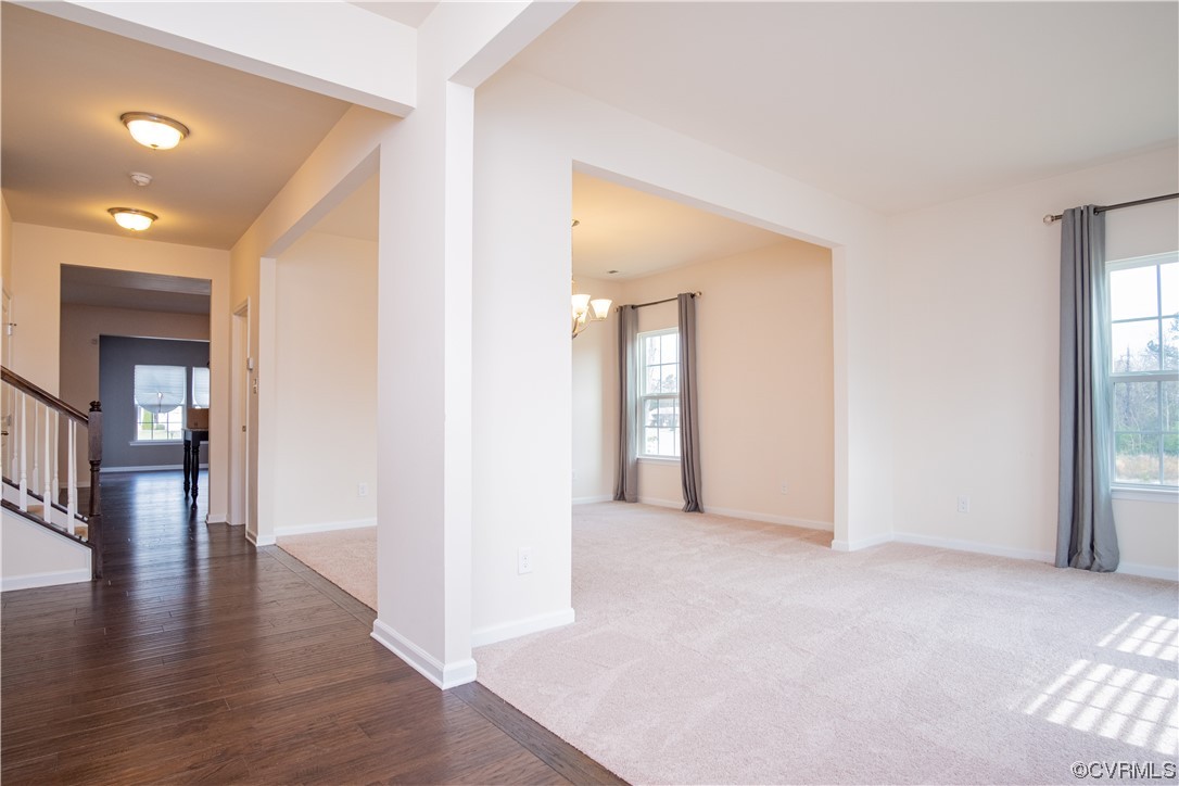 12800 Bailey Valley Drive Midlothian, VA 23112 - Photo 4 of 31 a view of empty room with wooden floor and windows