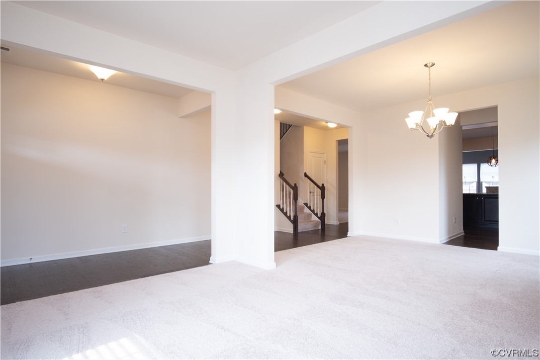 12800 Bailey Valley Drive Midlothian, VA 23112 - Photo 6 of 31 a view of a big room with windows and chandelier