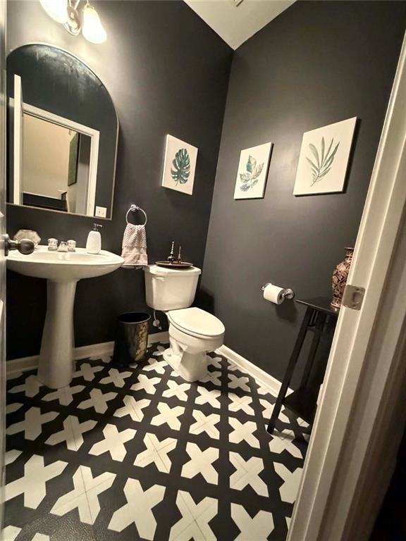 4832 Batiste Lane Acworth, GA 30101 - Photo 11 of 27 a bathroom with a sink toilet and mirror