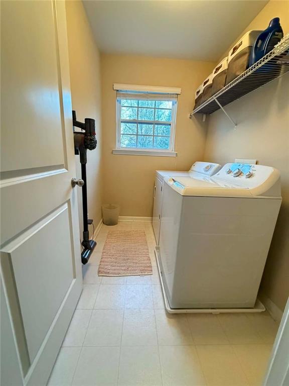 4832 Batiste Lane Acworth, GA 30101 - Photo 25 of 27 a utility room with a window dryer and washer