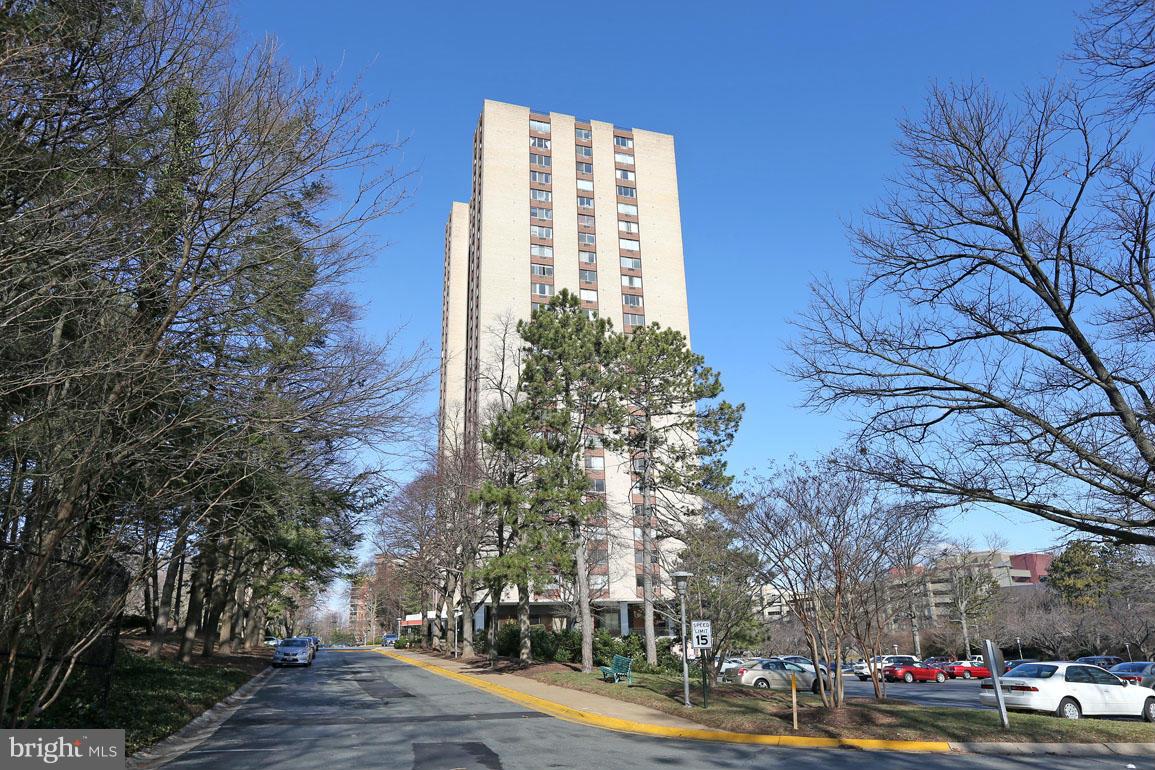 9701 Fields Road, Unit 603 Gaithersburg, MD 20878 - Photo 1 of 29 a view of a city view that has lots of trees