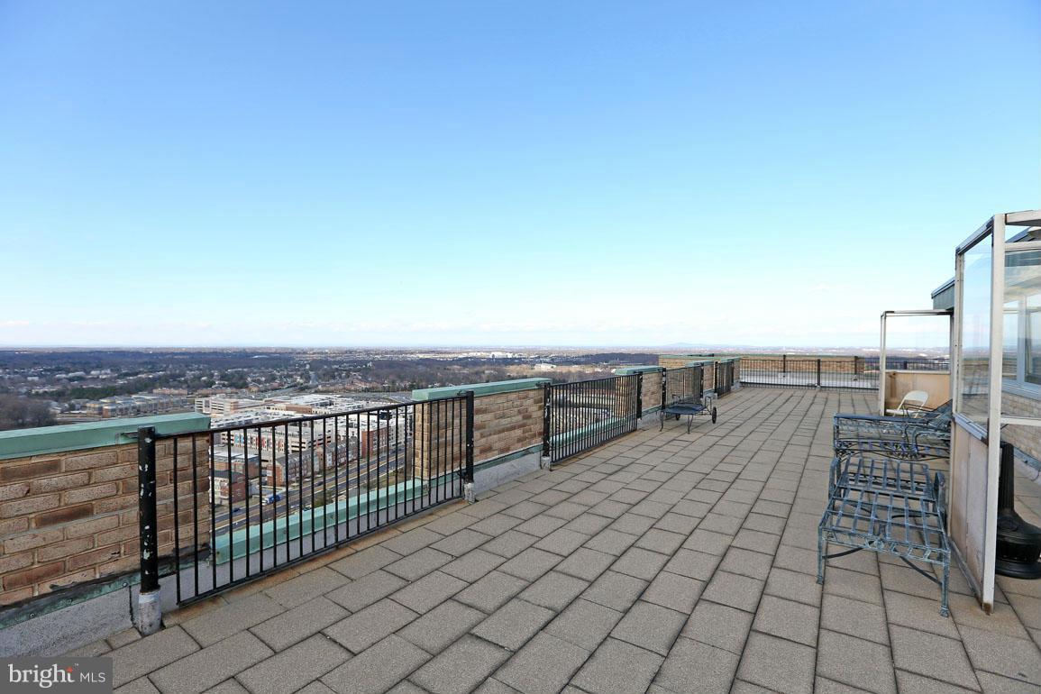 9701 Fields Road, Unit 603 Gaithersburg, MD 20878 - Photo 26 of 29 a view of terrace with city view