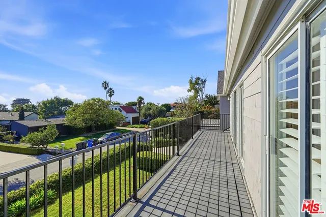 a view of a balcony with an outdoor space