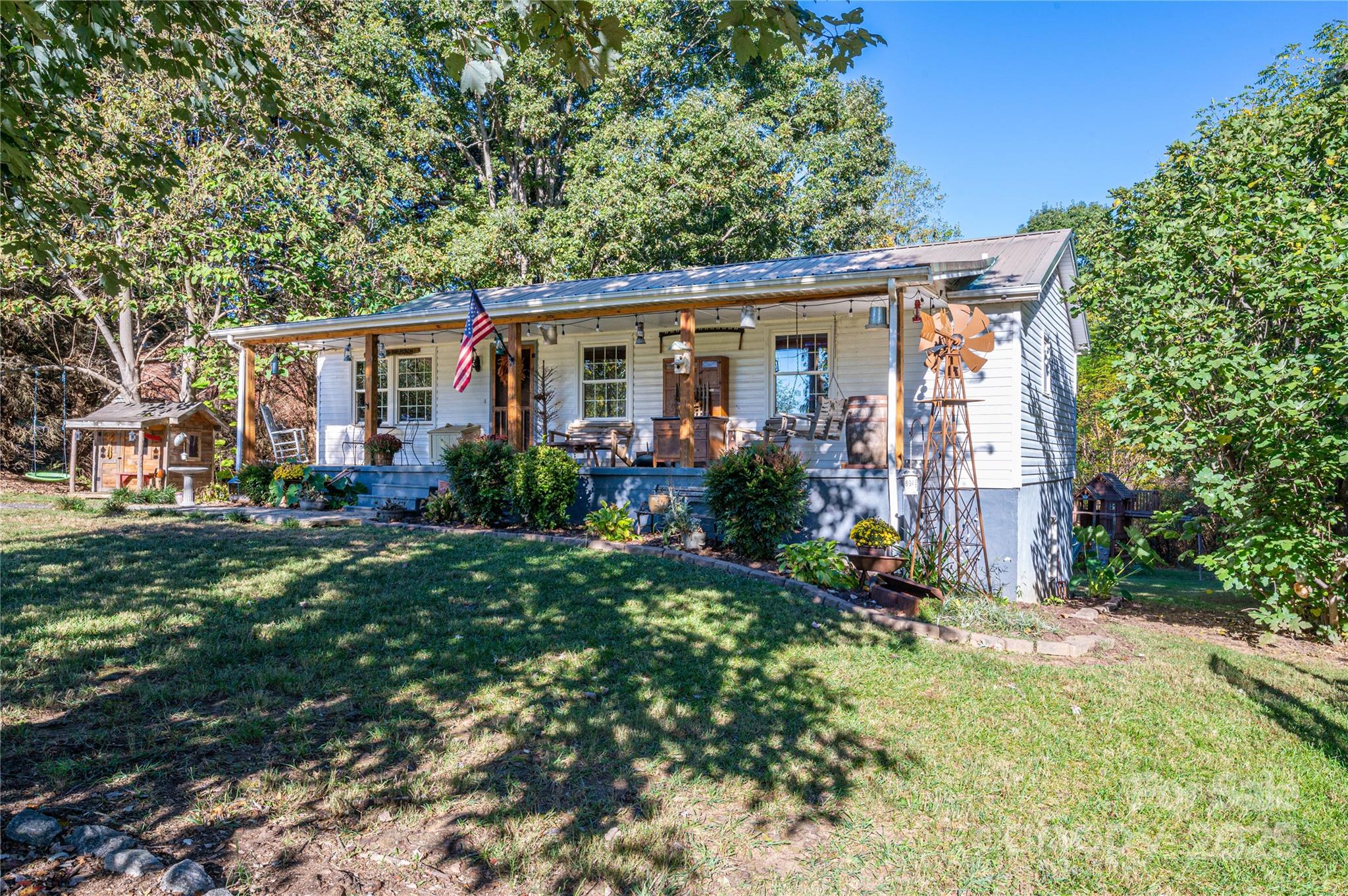6312 Bill Ledford Road Vale, NC 28168 - Photo 3 of 42 front view of a house with a yard