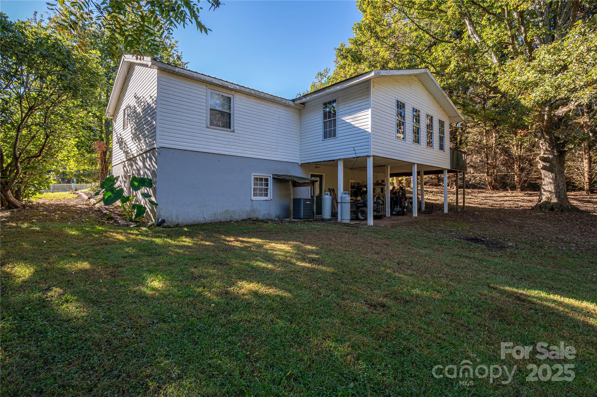 6312 Bill Ledford Road Vale, NC 28168 - Photo 34 of 42 a view of a house with a backyard