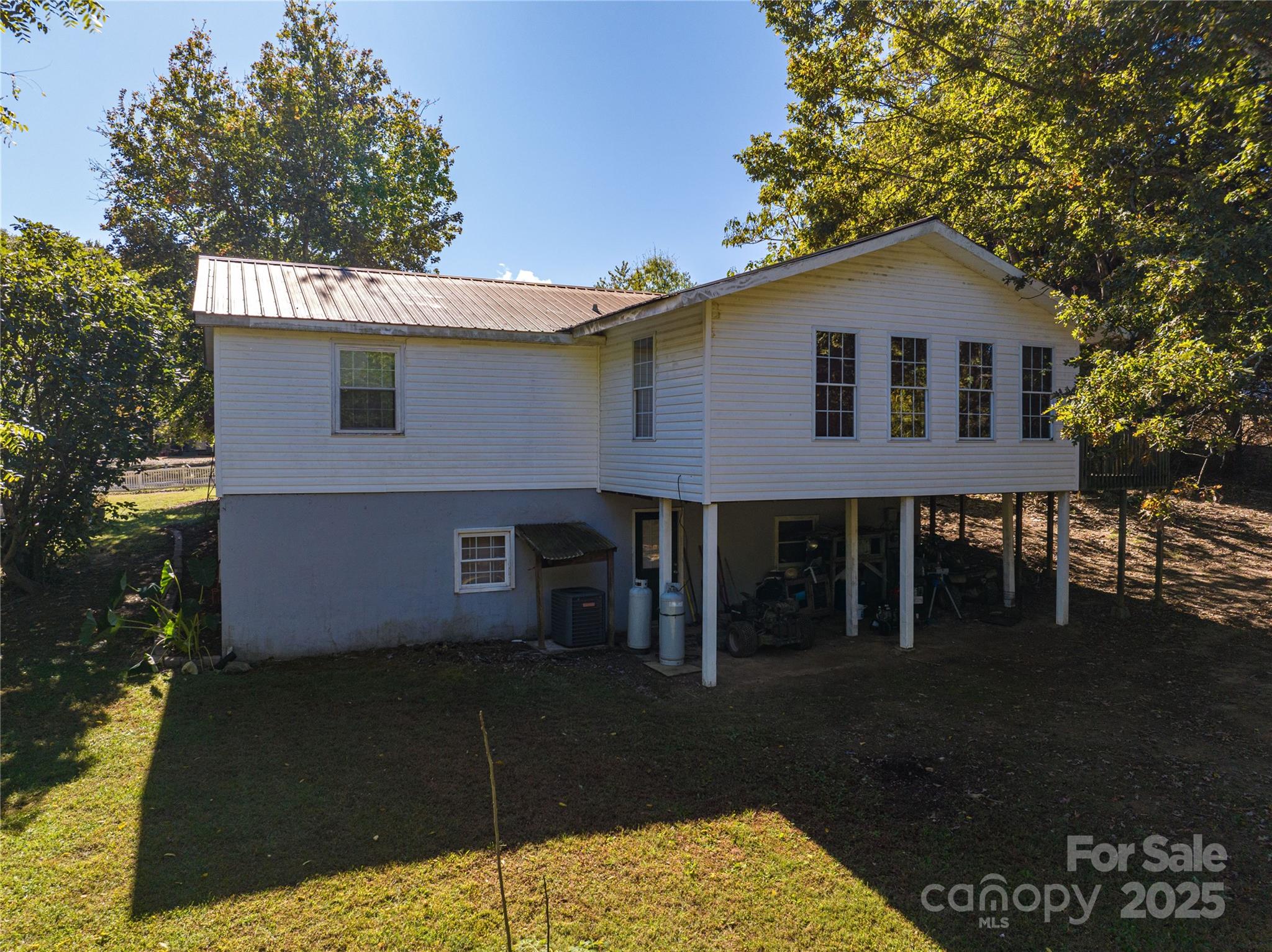 6312 Bill Ledford Road Vale, NC 28168 - Photo 35 of 42 a front view of a house with a yard