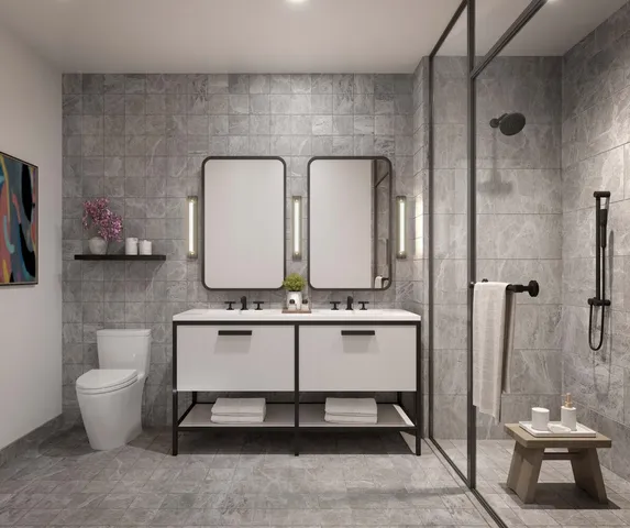 a bathroom with a double vanity sink and a mirror