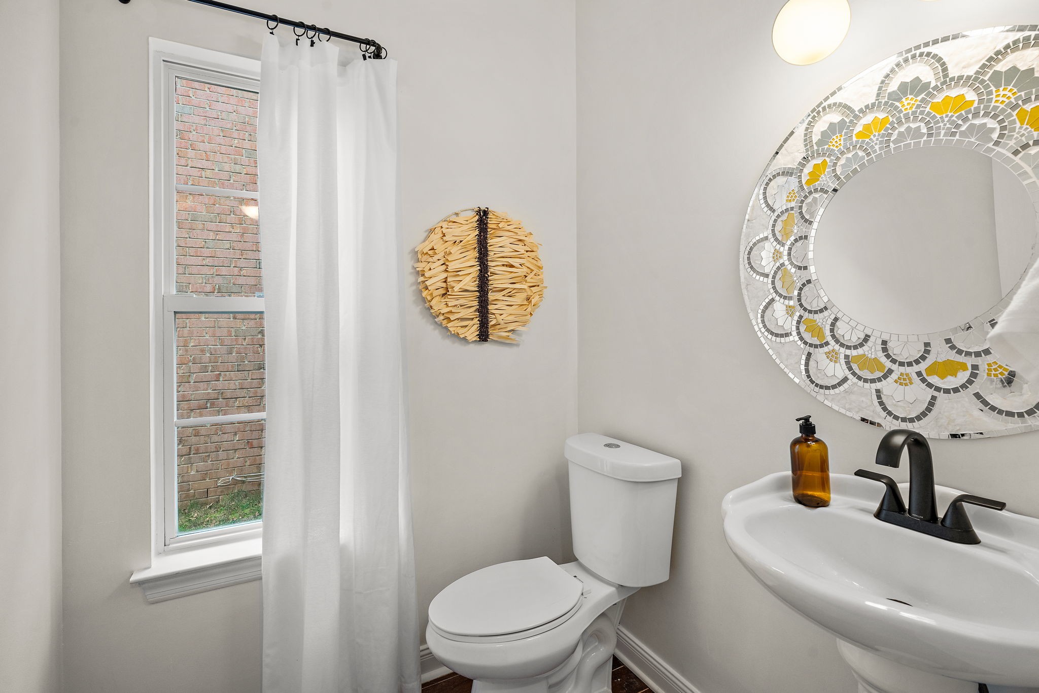 3140 Vera Valley Road Franklin, TN 37064 - Photo 19 of 38 a bathroom with a sink a toilet and a mirror