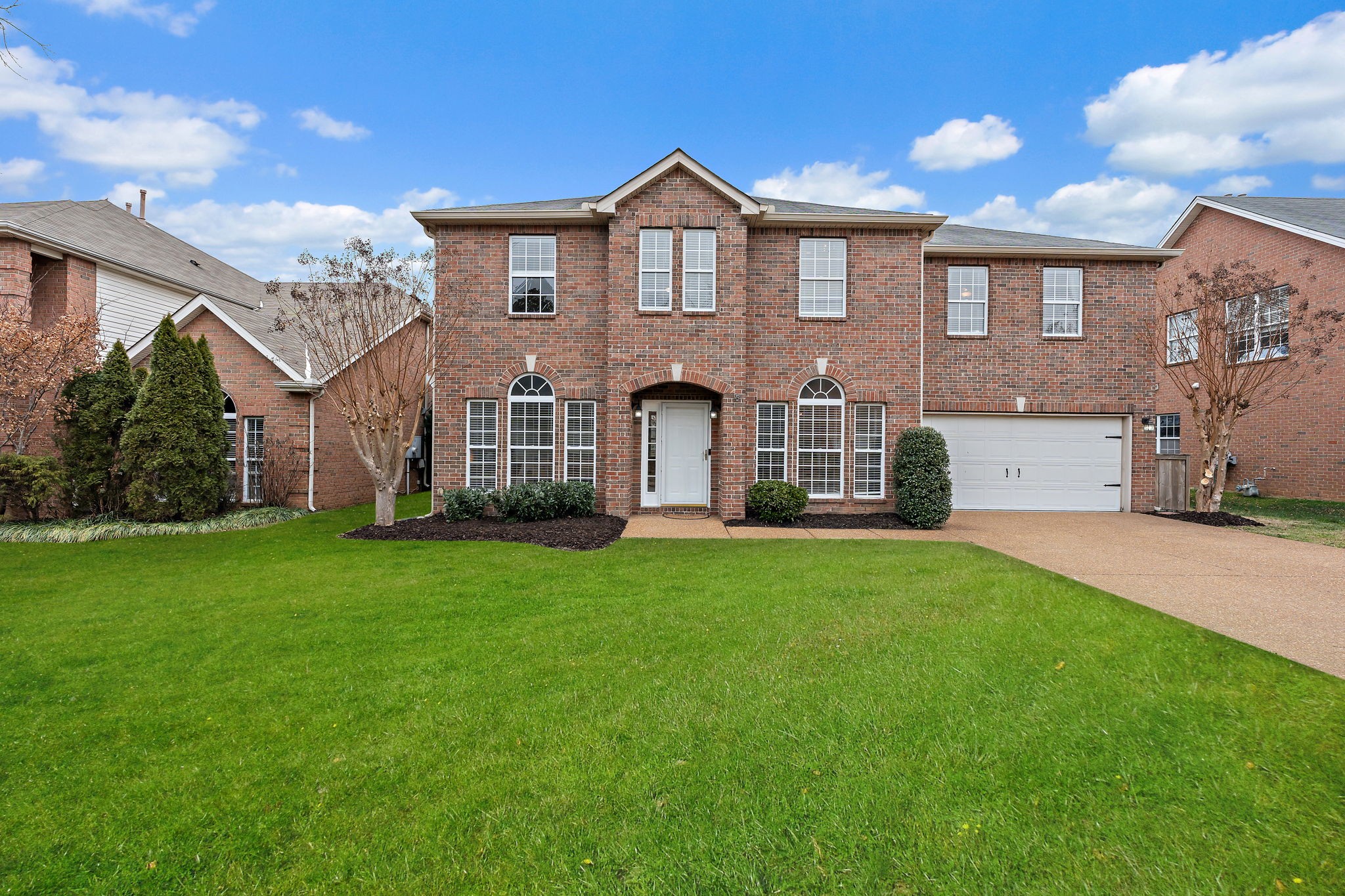 3140 Vera Valley Road Franklin, TN 37064 - Photo 2 of 38 a front view of a house with a garden