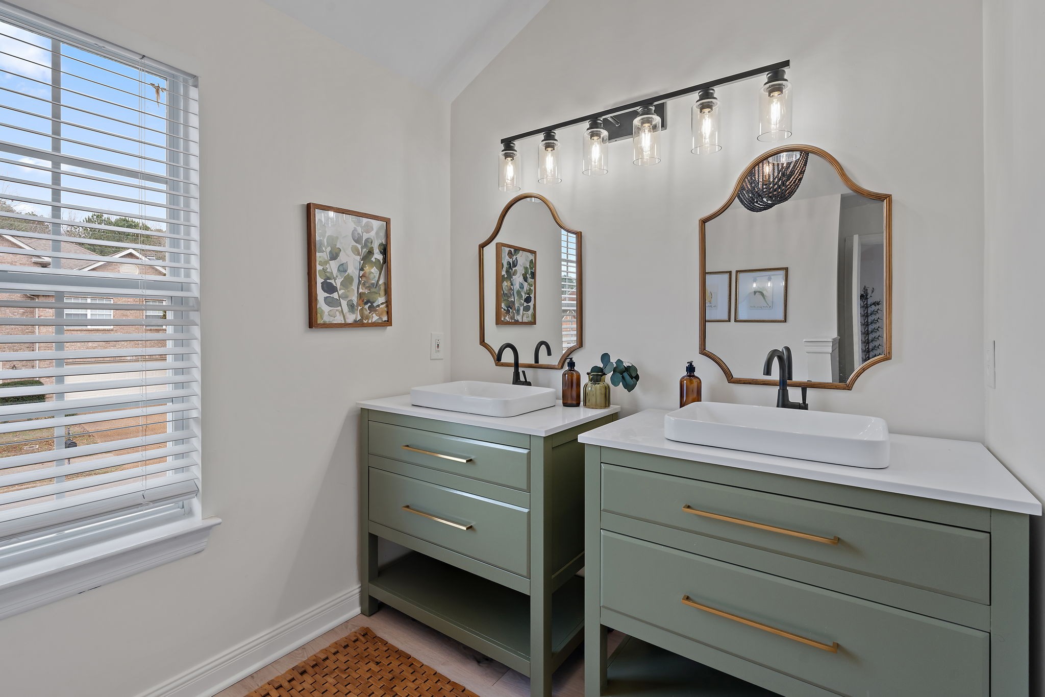 3140 Vera Valley Road Franklin, TN 37064 - Photo 26 of 38 a bathroom with a sink and a mirror