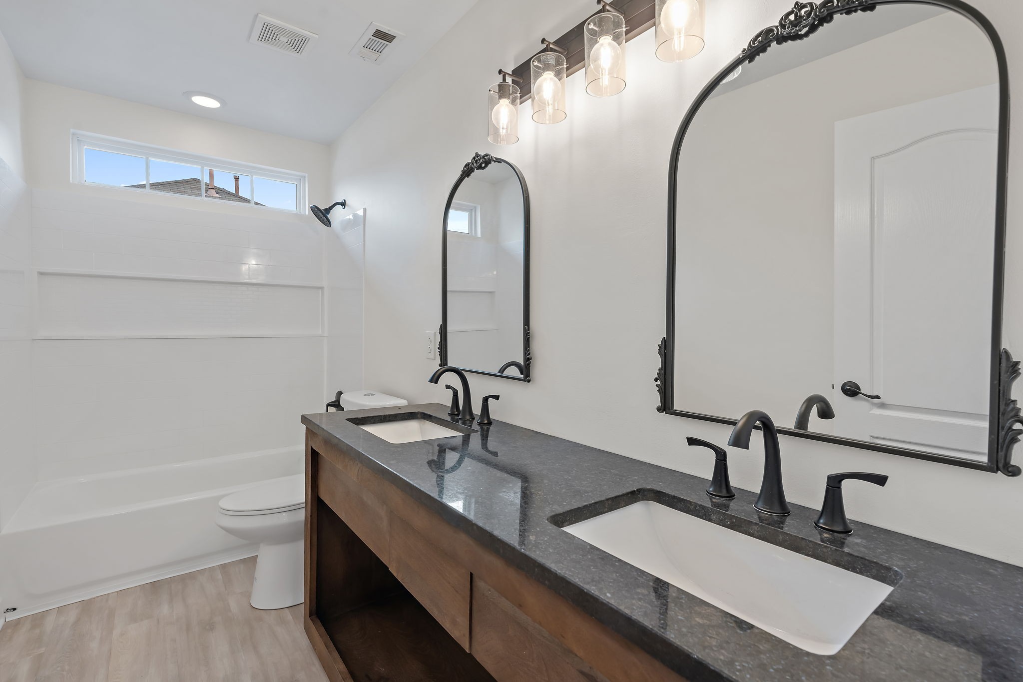 3140 Vera Valley Road Franklin, TN 37064 - Photo 34 of 38 a bathroom with a double vanity sink and a mirror