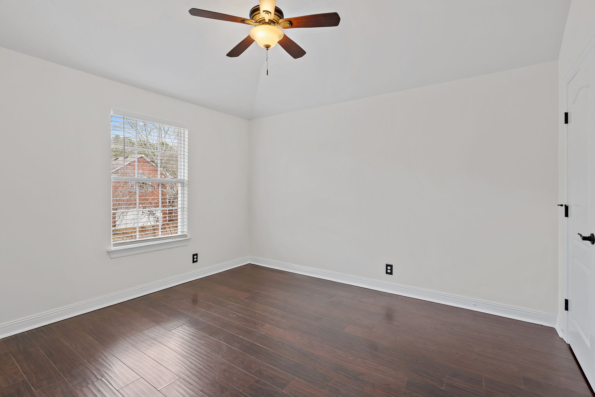 3140 Vera Valley Road Franklin, TN 37064 - Photo 35 of 38 a view of an empty room with wooden floor and a window