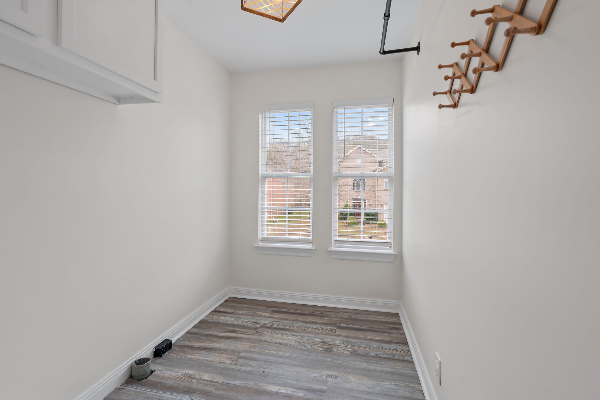 3140 Vera Valley Road Franklin, TN 37064 - Photo 36 of 38 a view of an empty room with wooden floor and a window