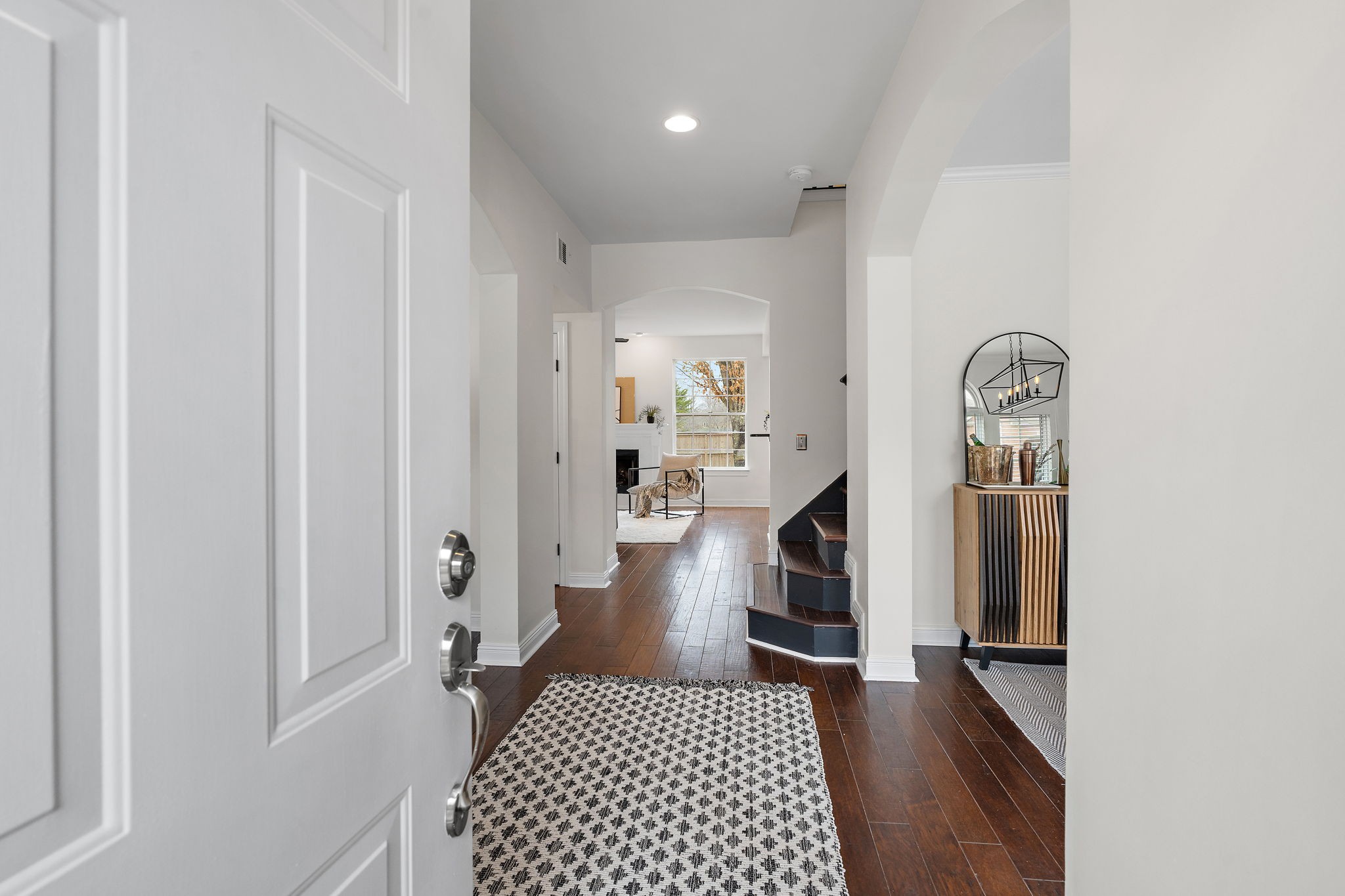 3140 Vera Valley Road Franklin, TN 37064 - Photo 4 of 38 a view of a hallway with wooden floor windows and a bathroom