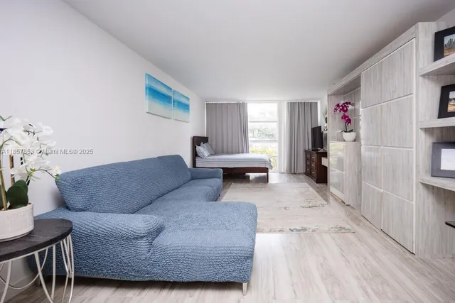 a living room with furniture and a couch