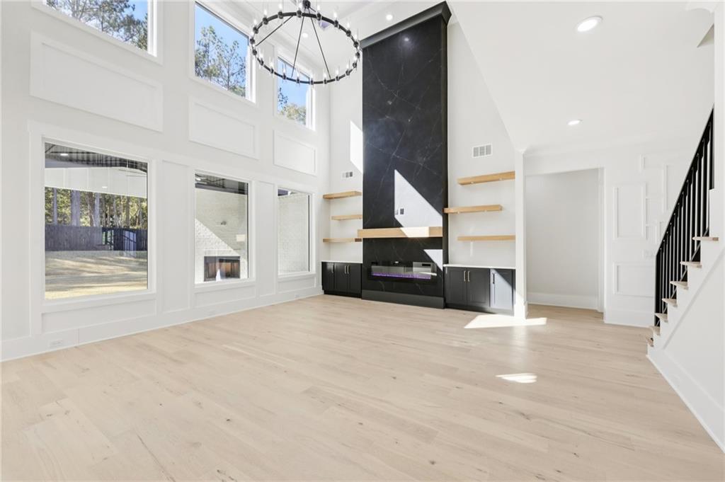 3207 Bold Springs Road Dacula, GA 30019 - Photo 12 of 67 a view of entryway and hall with wooden floor