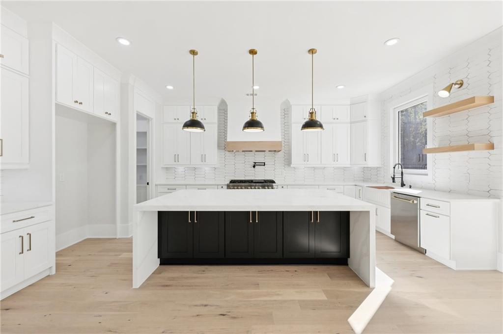 3207 Bold Springs Road Dacula, GA 30019 - Photo 25 of 67 a bathroom with double vanity and a bathtub