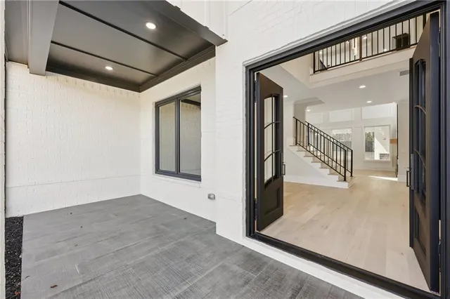 a view of a hallway with entryway