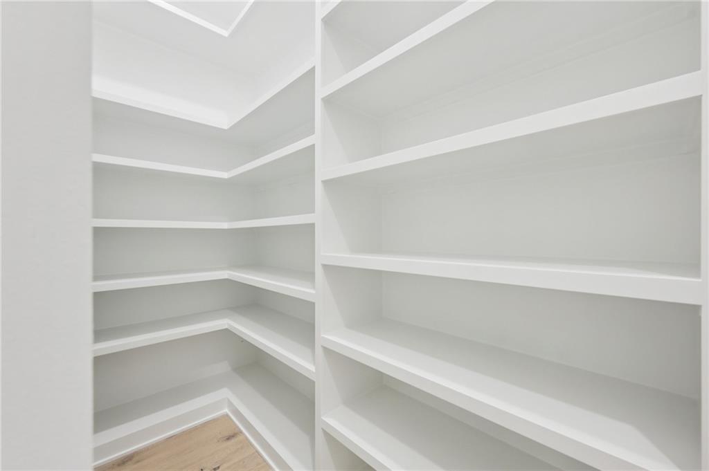 3207 Bold Springs Road Dacula, GA 30019 - Photo 43 of 67 a view of walk in closet with empty racks