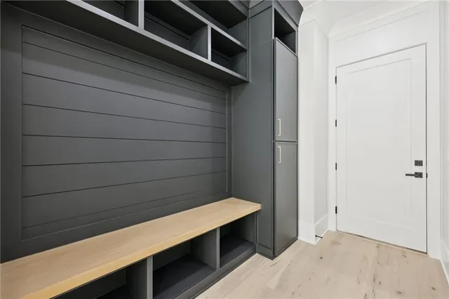 a bathroom with a double vanity sink mirror and double