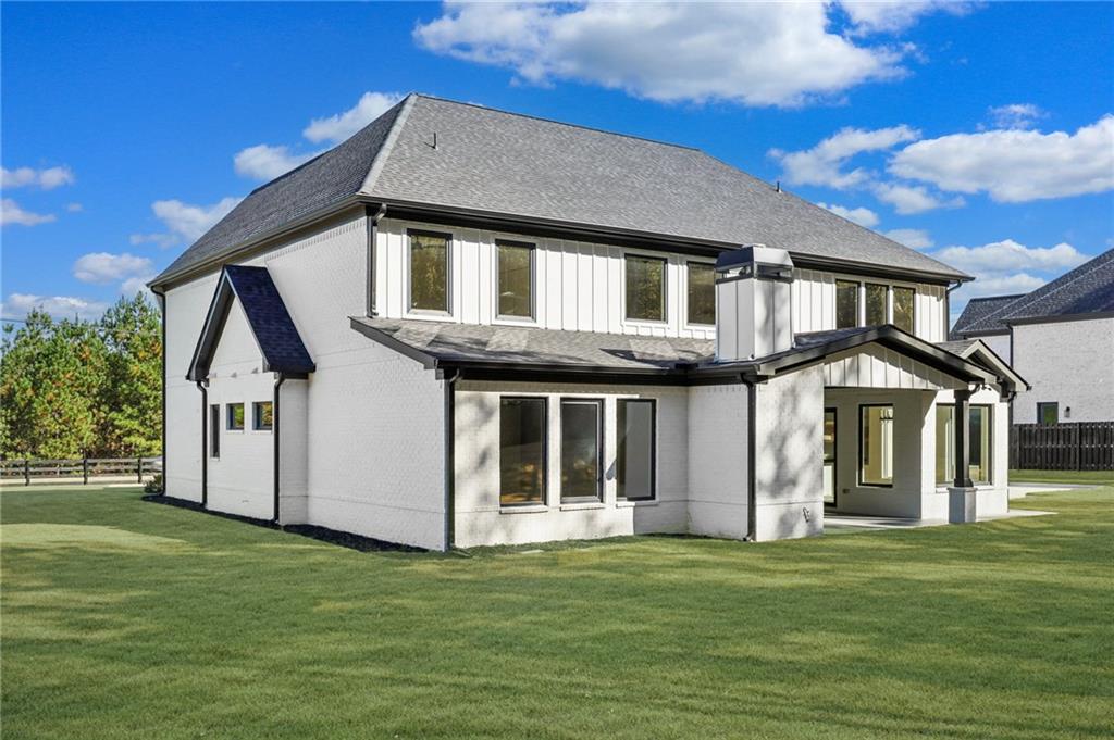 3207 Bold Springs Road Dacula, GA 30019 - Photo 65 of 67 a front view of a house with a garden