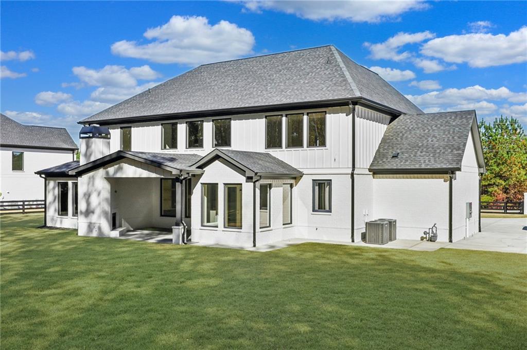 3207 Bold Springs Road Dacula, GA 30019 - Photo 66 of 67 a front view of a house with a yard