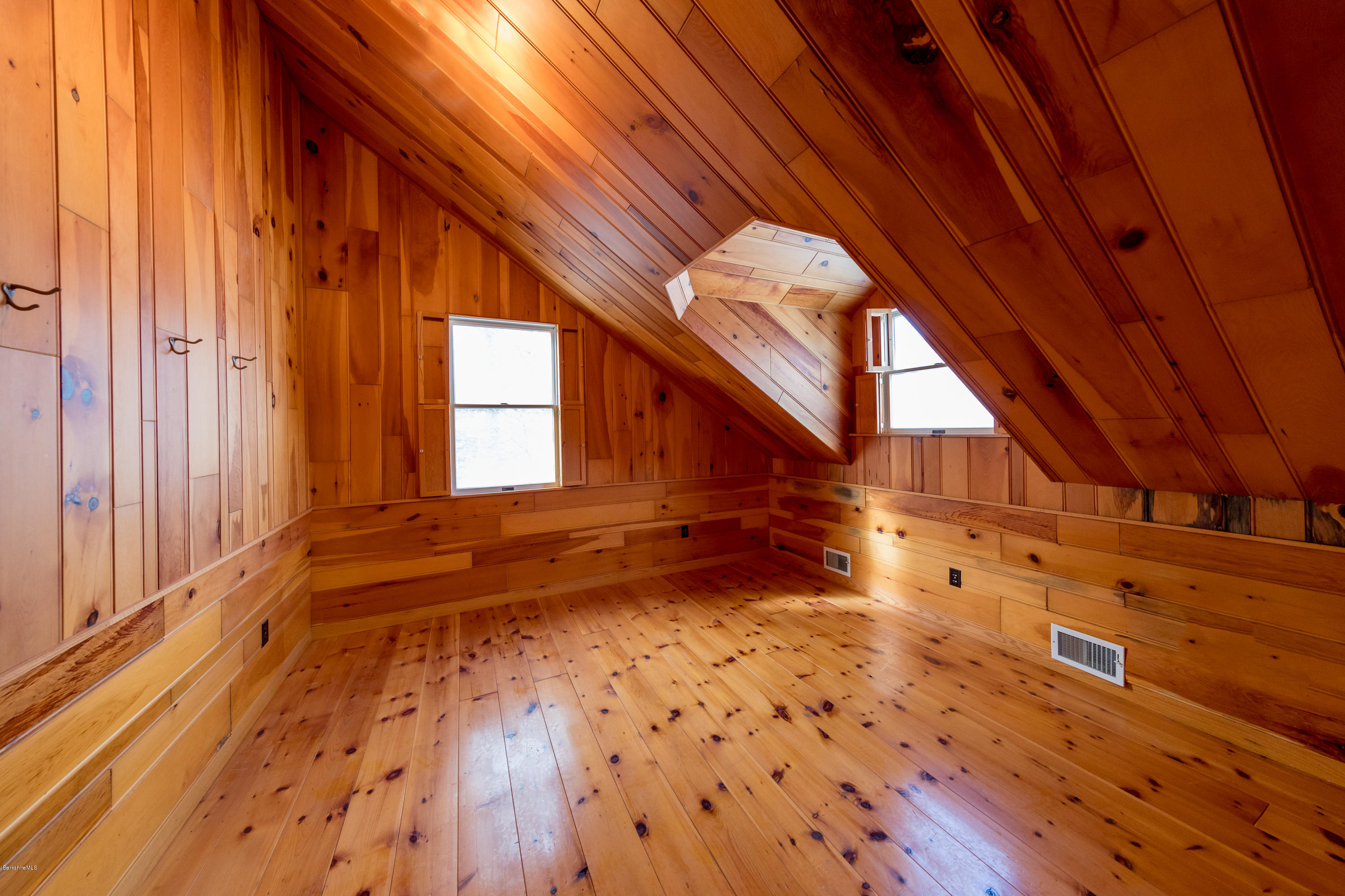 54 Patten Road Shelburne, MA 01370 - Photo 16 of 30 a view of an empty room with wooden floor and a window